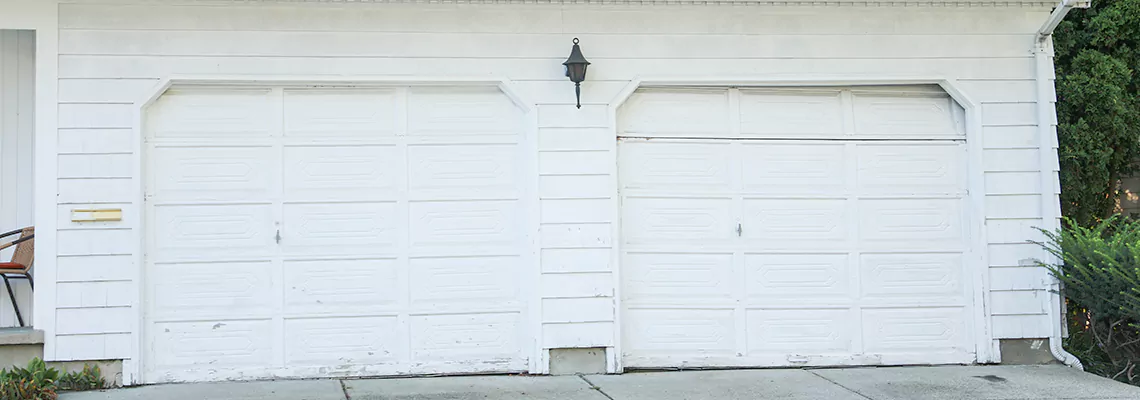 Roller Garage Door Dropped Down Replacement in Chicago, IL