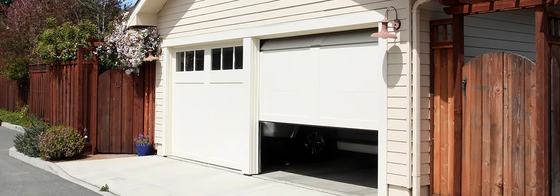 Fix Metal Garage Door Jerking in Chicago, Illinois